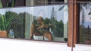Spying on doxy neighbor wanking on balcony