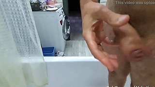 Stepmom with big melons jacks off son dick in the bath