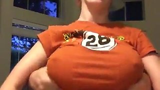 nerd with big milk sacks orange shirt